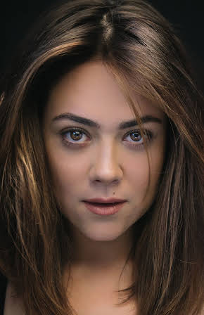 Camille Guaty as 