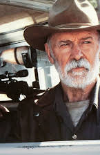 Bill Kerr som Director