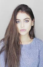 Lauren Giraldo as 