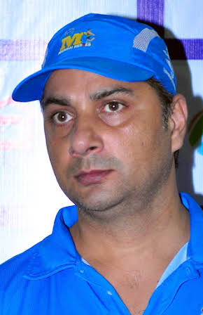 Varun Badola as 