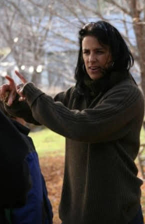 Nance Ackerman as Director