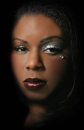 Toya Alexis as 