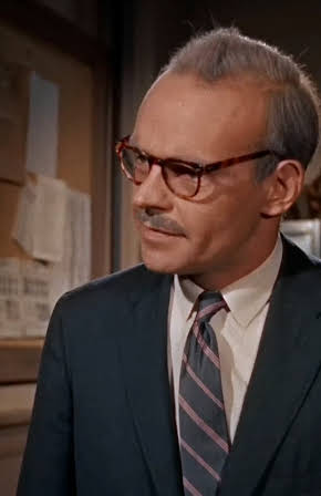 Elbert Smith as Director