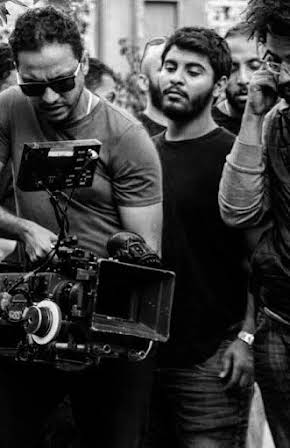 Peter Mimi as Director