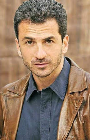 Michael Aronov as 