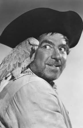 Robert Newton as 