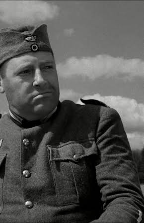 Richard George as Kommandant Bernsdorff