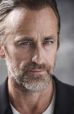 Crispian Belfrage as 