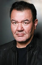 Patrick Gallagher como 