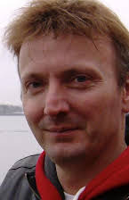 Stephen Cookson som Director