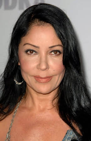 Apollonia Kotero as 