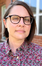 Megan Gilbride como Director