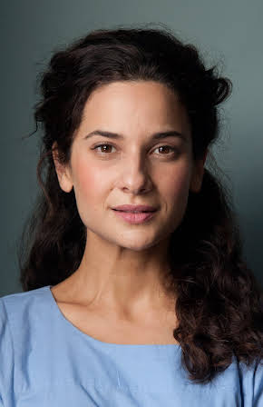 Andrea Demetriades as 