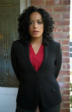 Liza Colón-Zayas as Mrs. Cruz
