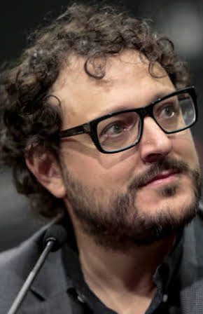 Dani de la Torre as Director
