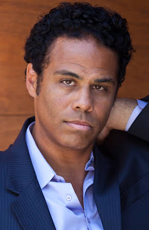 Adam Lazarre-White as 