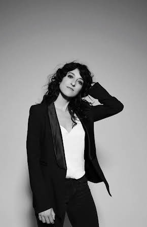 Jenna Laurenzo as Director