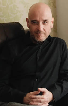 Salvador Simó as Director