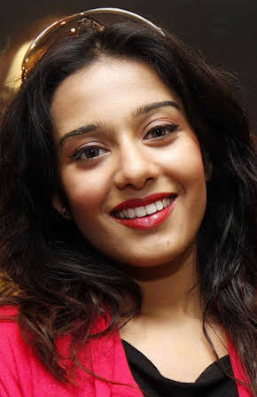 Amrita Rao as 