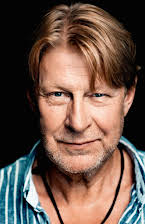 Rolf Lassgård as 