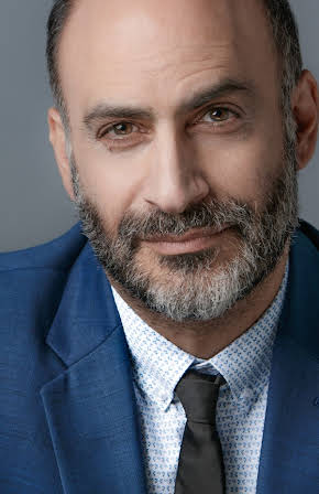 Michael Benyaer as 