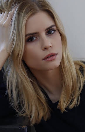 Carlson Young as 