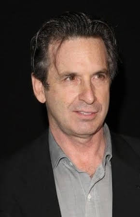 Robert Carradine as 