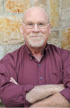 William Cameron como The Newsman