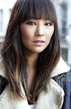 Greta Lee as 