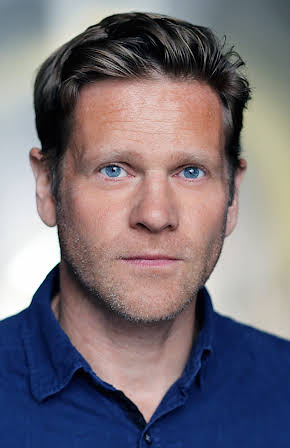 Adam Astill as 