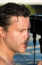 Frank E. Flowers as Director