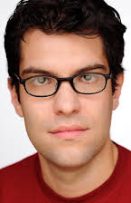 Dan Mintz como 