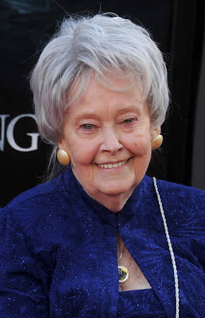 Lorraine Warren as 