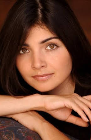Ara Celi as Reporter