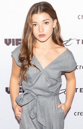 Katie Douglas as 