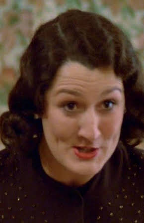 Rachel Bell as Midwife