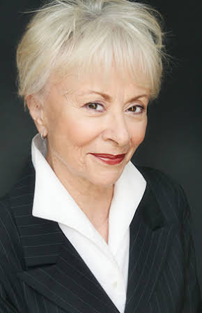 Carol Locatell as 