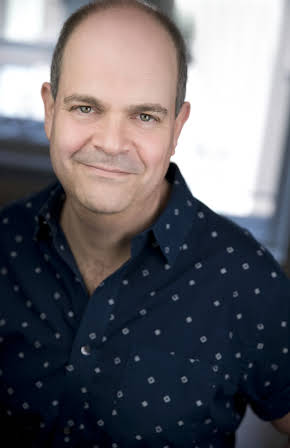 Brad Oscar as Day Doorman