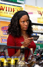 Erica Vittina Phillips som Liquor Store Cashier