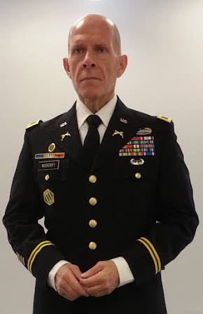 Robert Catrini as 