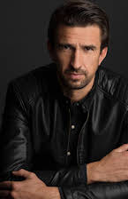 Daniel Adams as Director