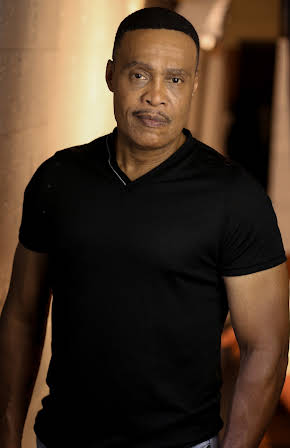 L. Warren Young as 