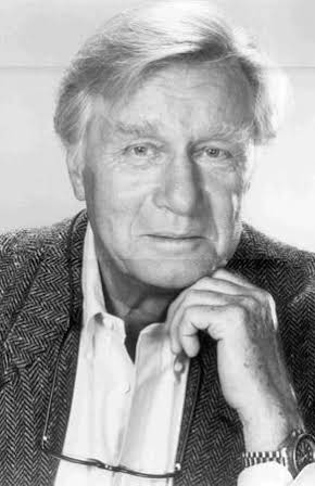 George Gaynes as Father Robert