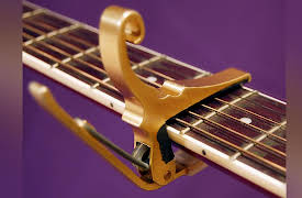 Learning to Play Guitar: Chords, Scales, and Solos: A New Pentatonic Scale and the Capo