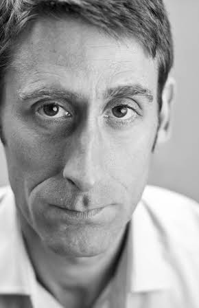 Daniel Tuite as Drinks Trader