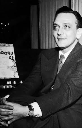 Frederick Loewe as Director
