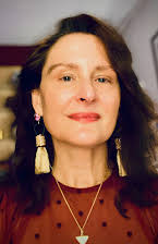 Gretl Claggett as Director