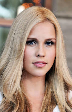Claire Holt as 