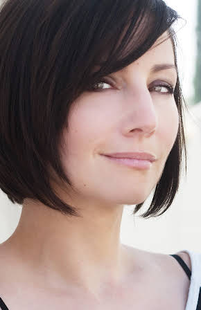 Heather McComb as 