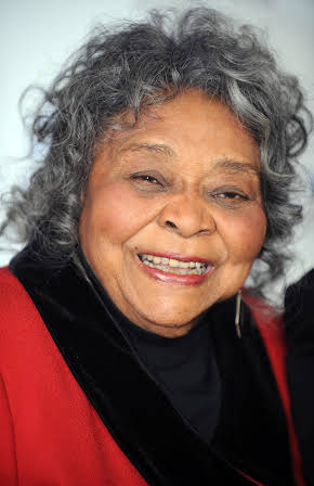 Juanita Moore as Dominique